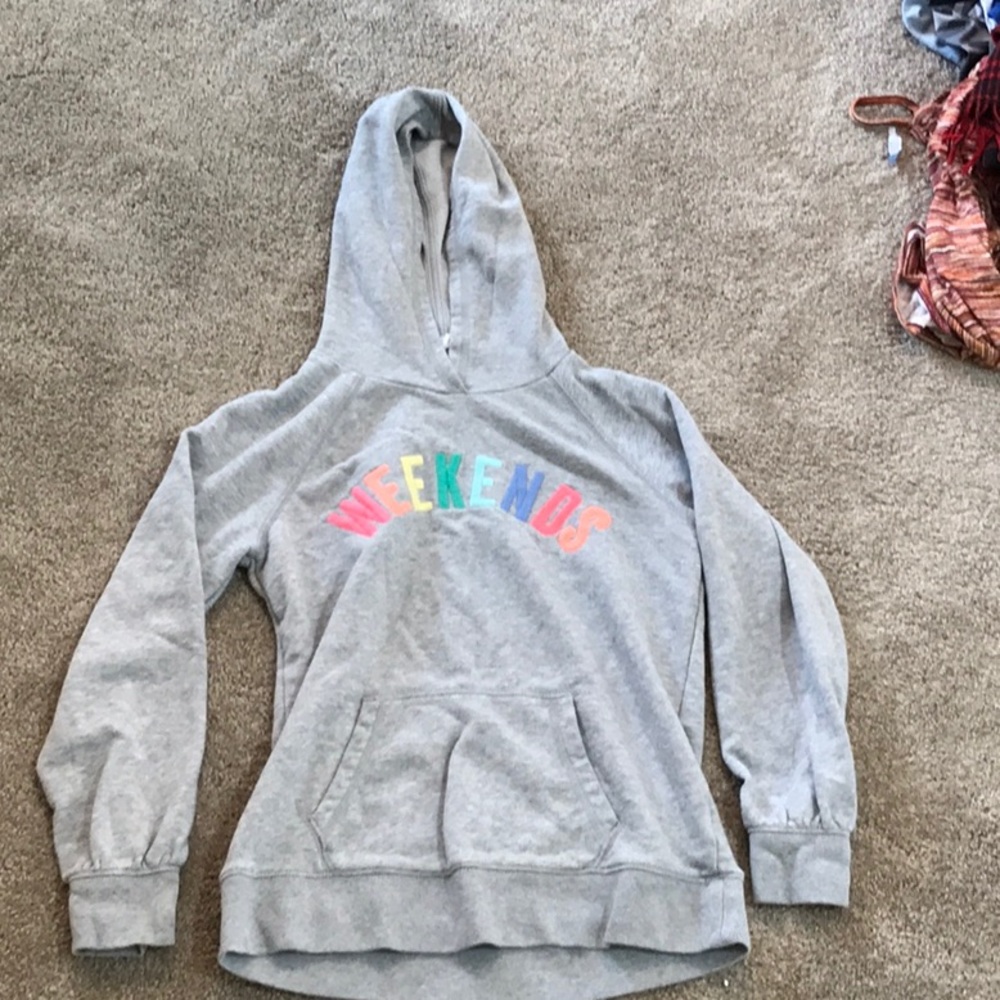 Grey hoodie with the word weekend on it.